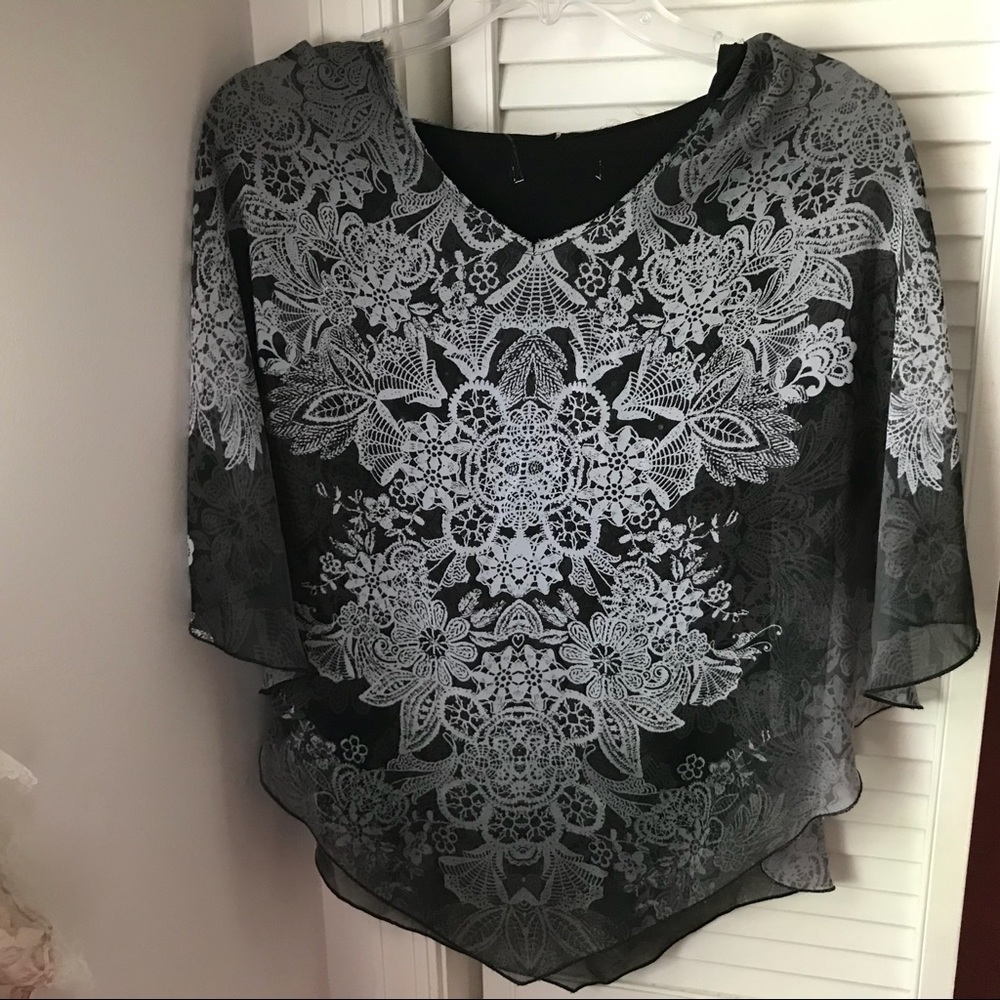 NWT flowy floral design black layered top
